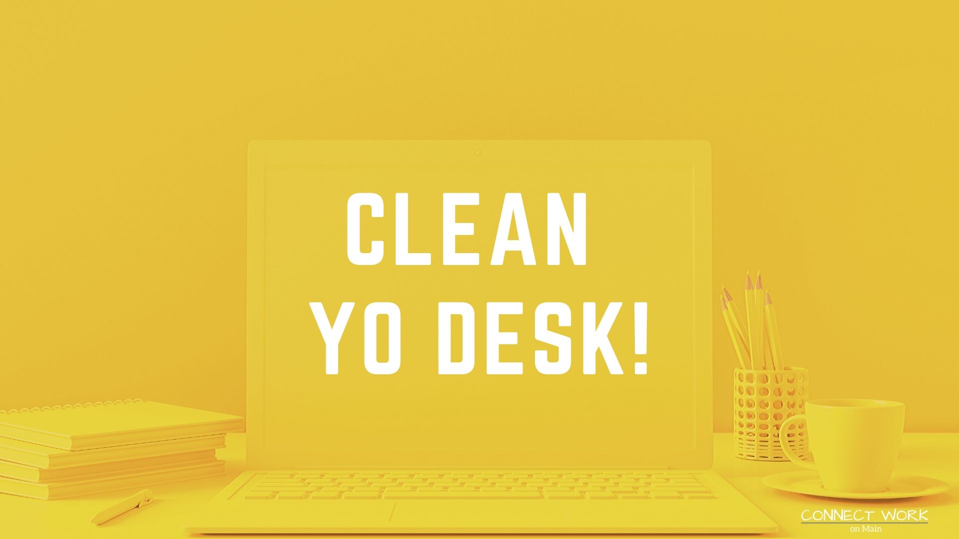 Text: "Clean your desk" - with yellow stock photo of computer and desk
