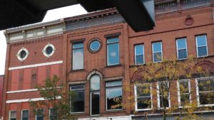 8 Reasons Why Your Emergency Plan Needs Butler Coworking - a building on Main St Butler PA with many windows